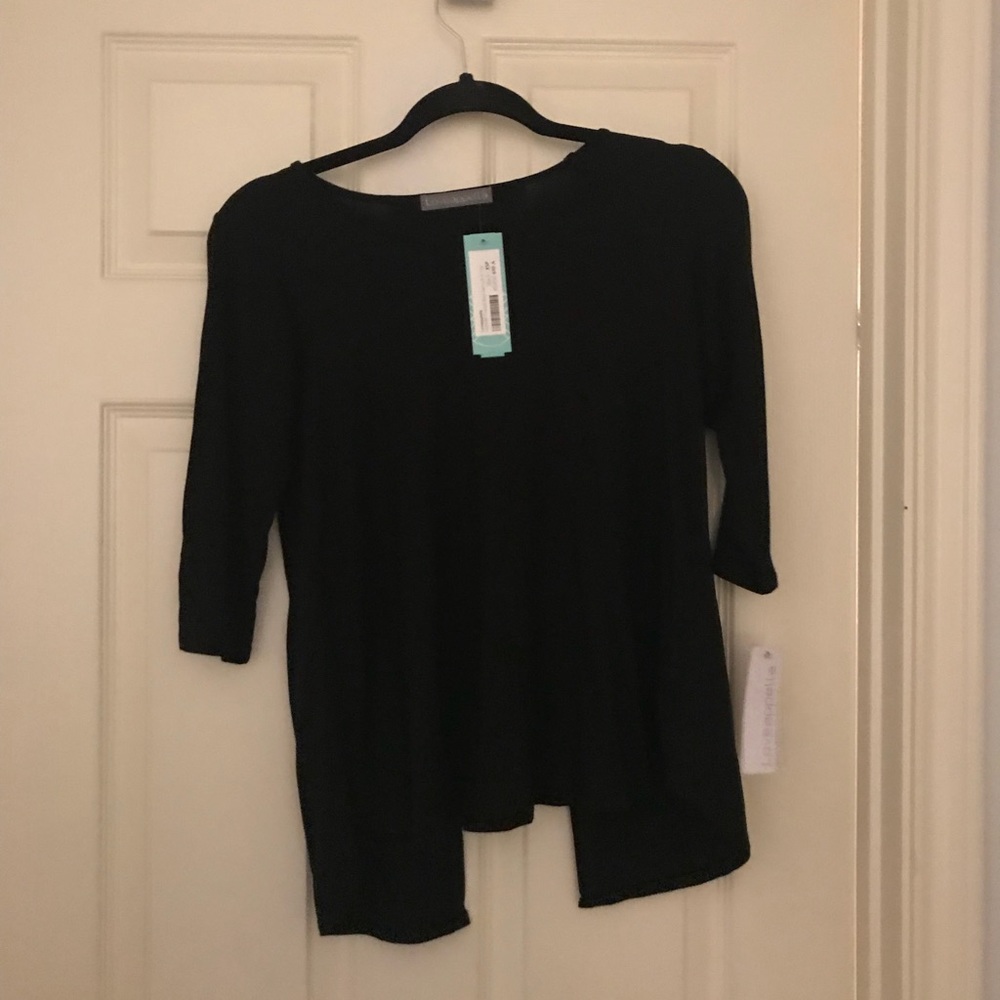 Black long sleeved top with back cutouts